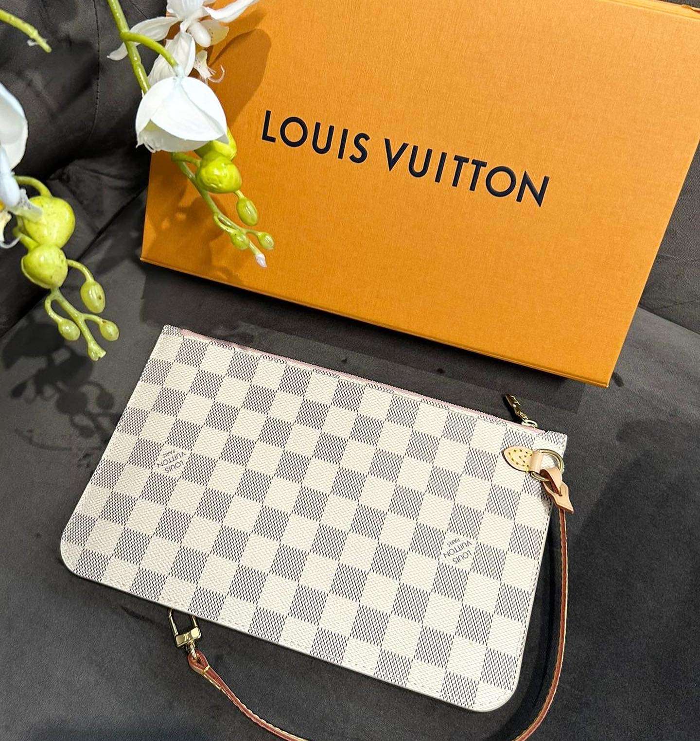 Louis Vuitton clutch z Neverfullky