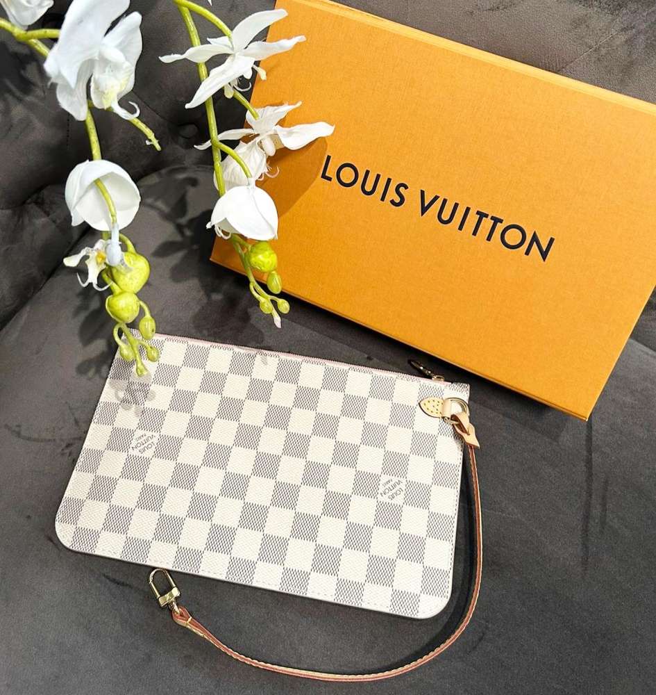 Louis Vuitton clutch z Neverfullky