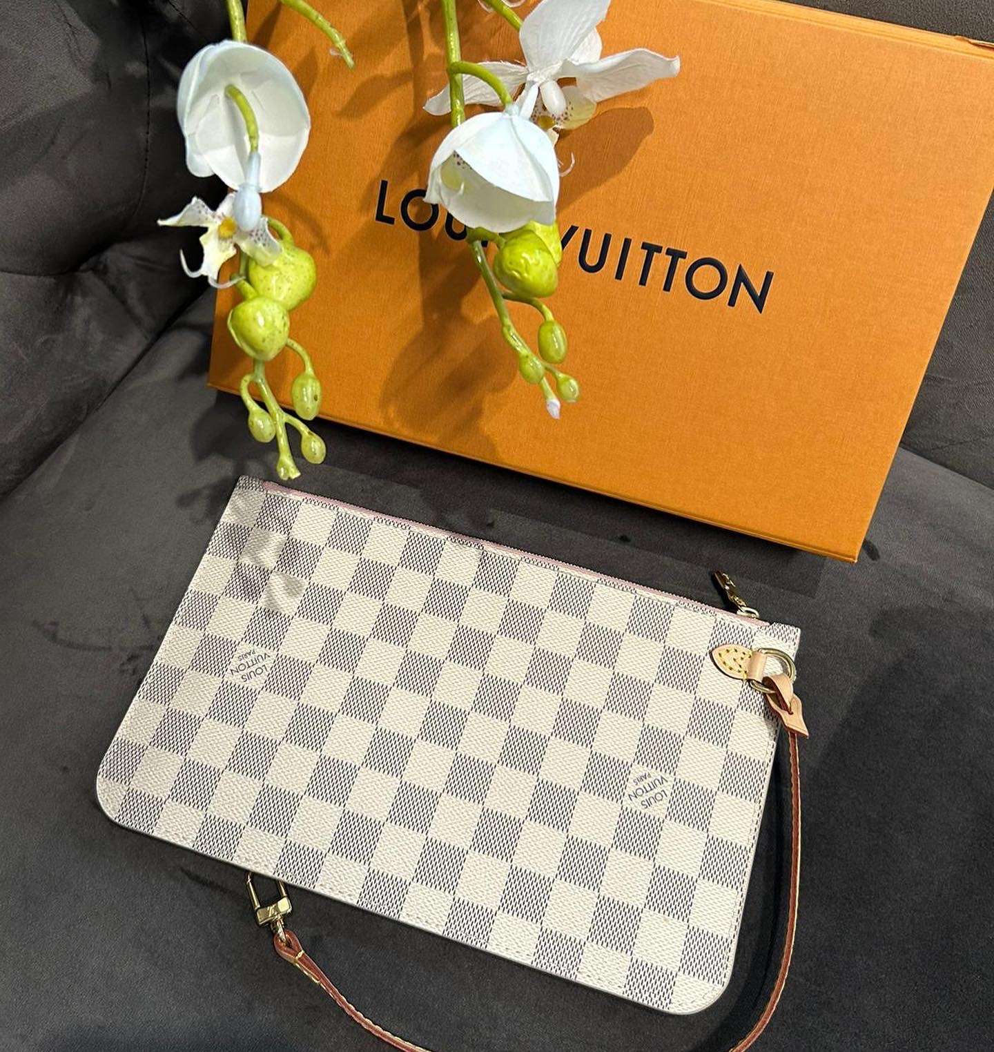 Louis Vuitton clutch z Neverfullky