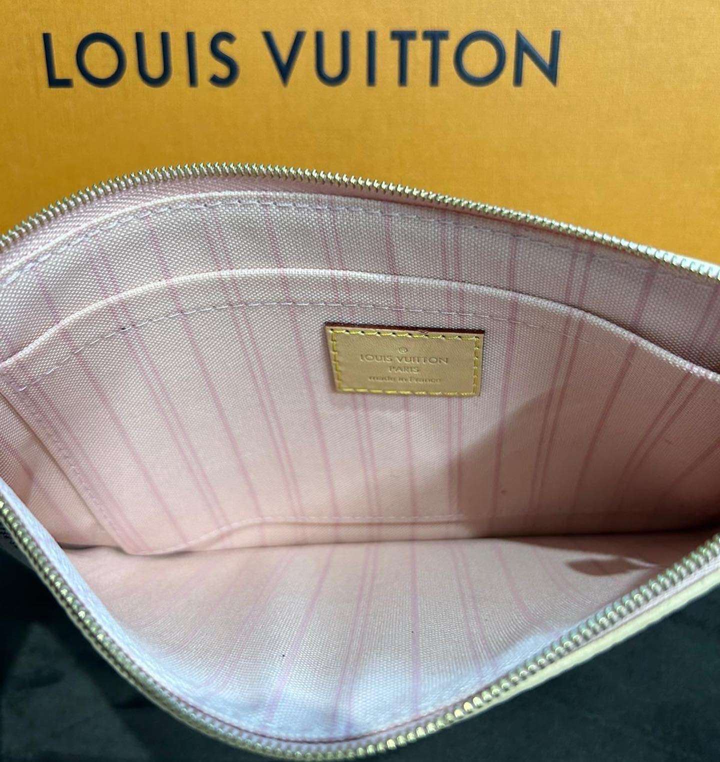 Louis Vuitton clutch z Neverfullky