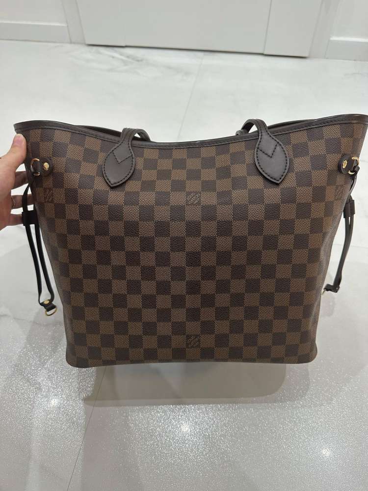 Louis Vuitton Neverfull MM s clutch