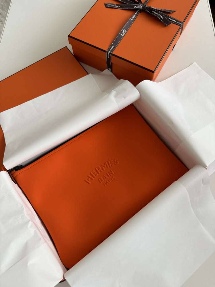 Hermes neopren pochetka stredna velkost