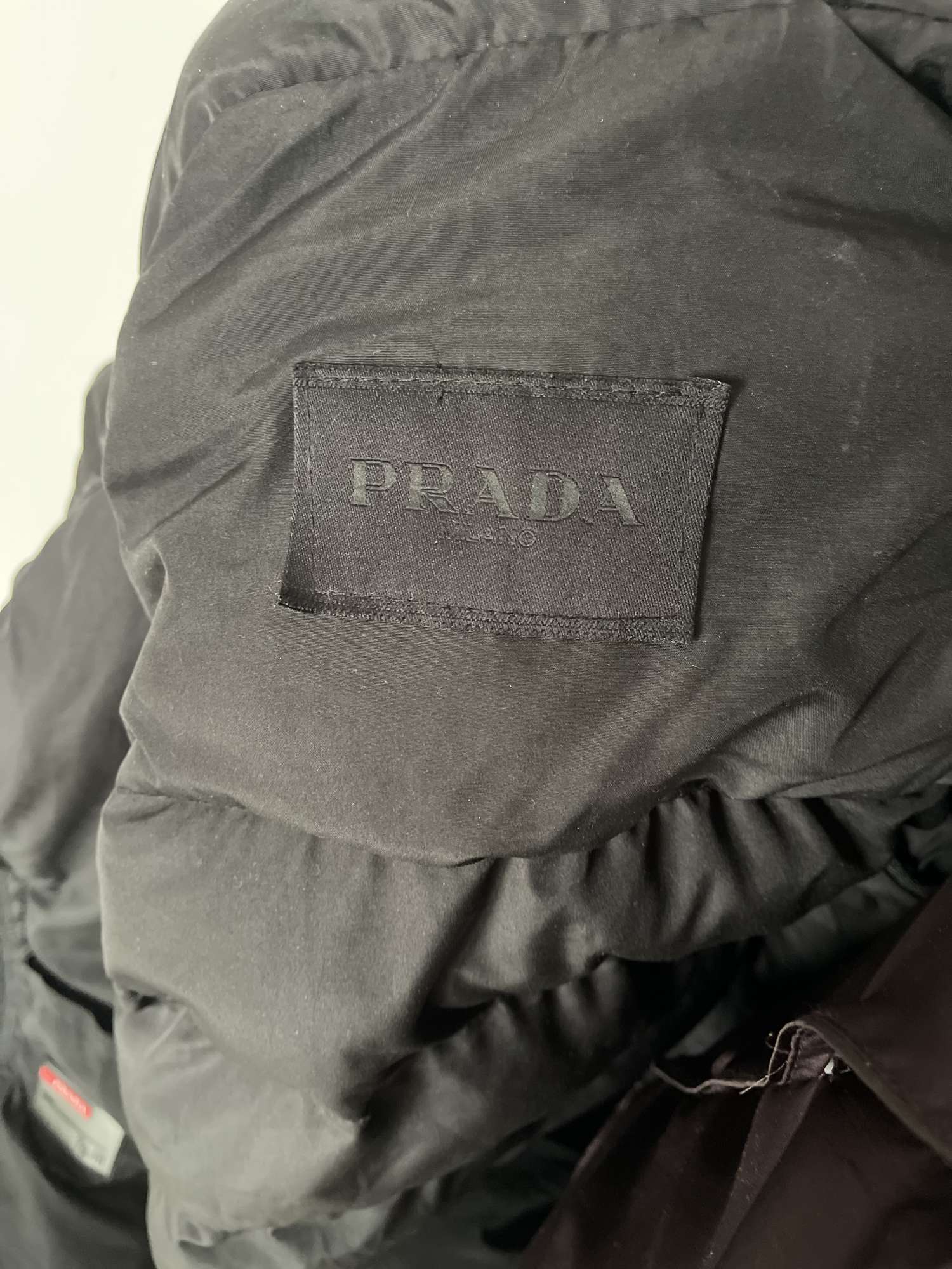 Damska zimná bunda Prada