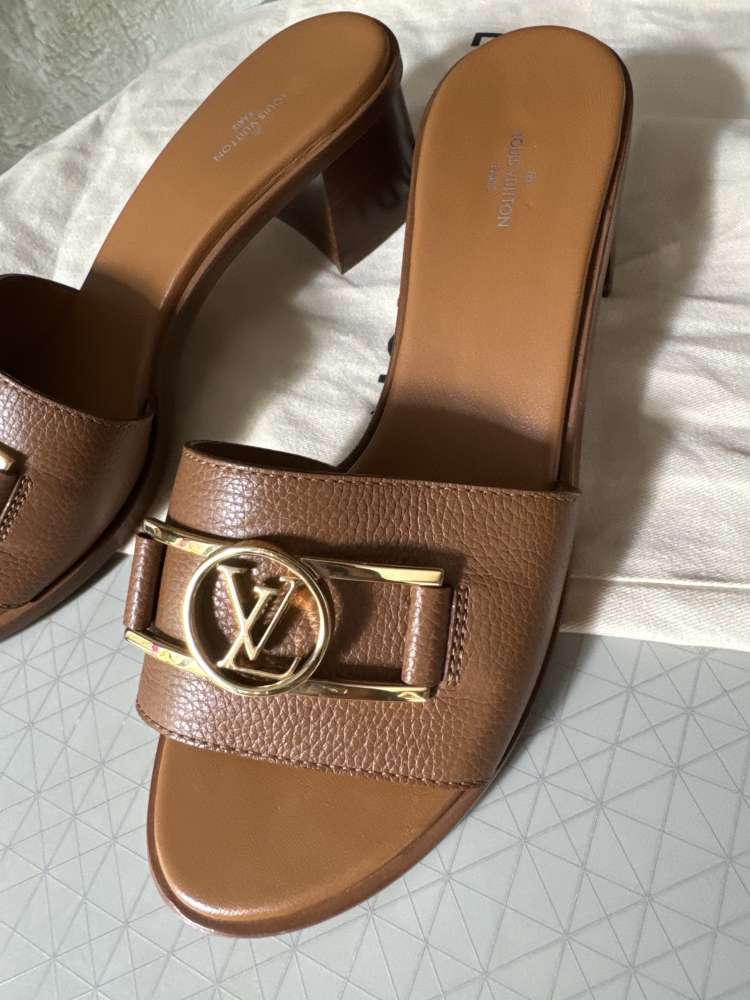 Louis Vuitton Lock it leather Mules