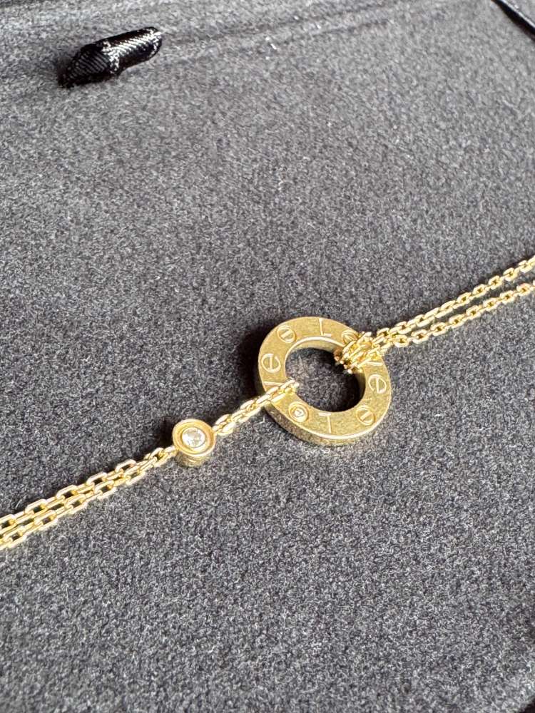 Cartier Love Bracelet, on chain with 2 diamonds