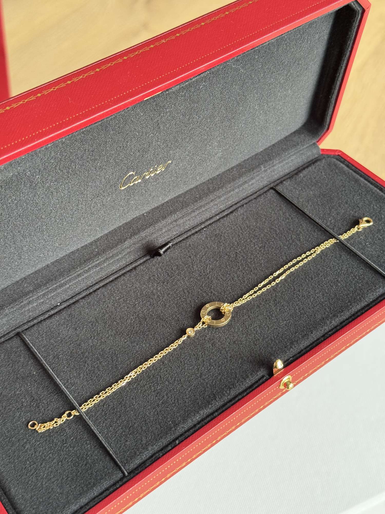 Cartier Love Bracelet, on chain with 2 diamonds