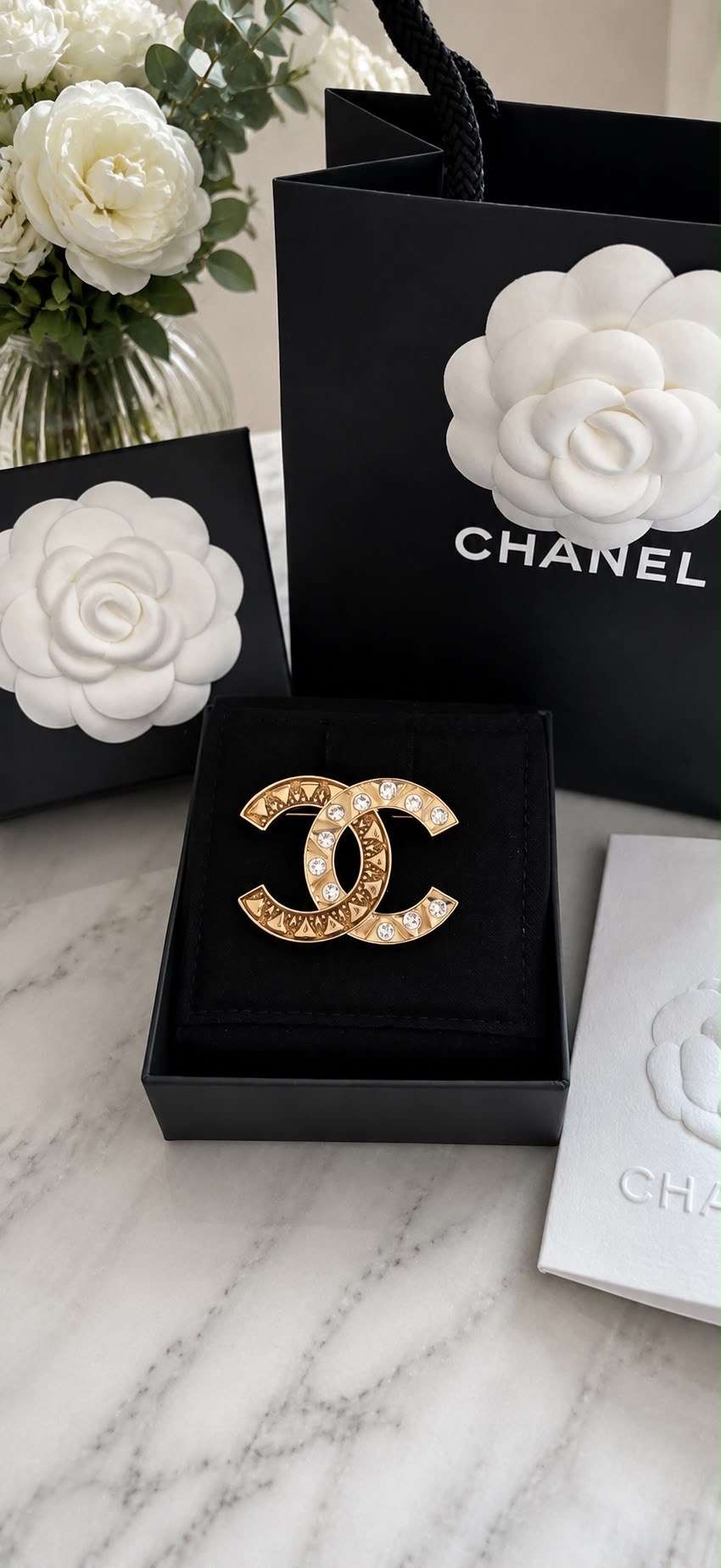 Chanel brošňa