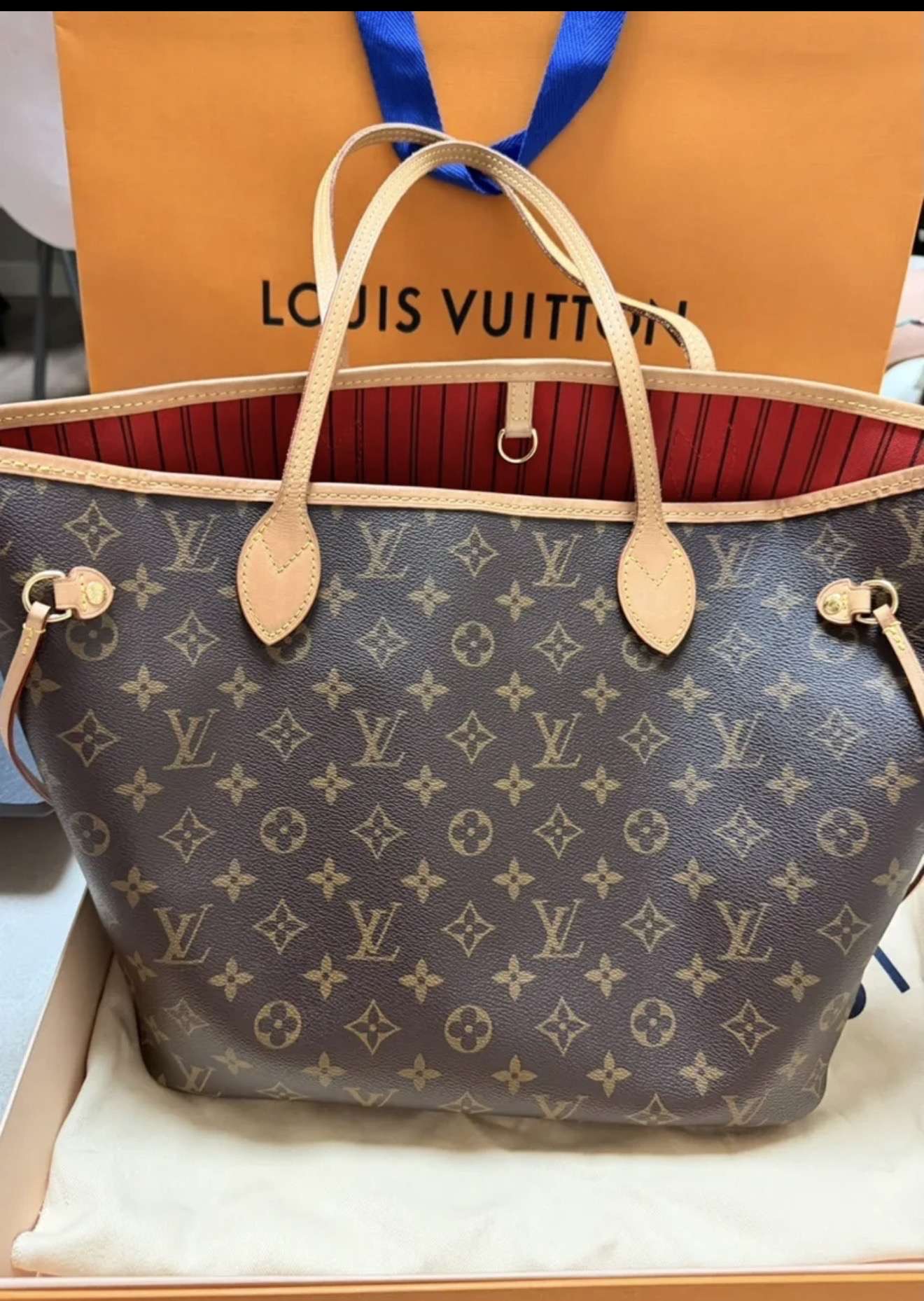 Louis Vuitton Neverfull MM s clutchom