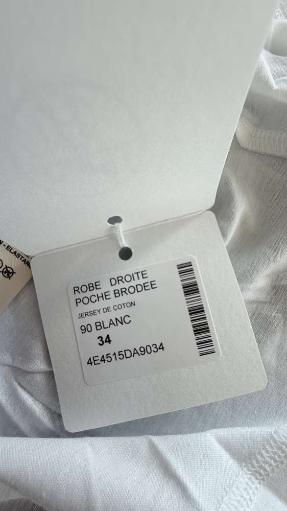 Vyšívané šaty Hermès s vreckom v tvare „H“