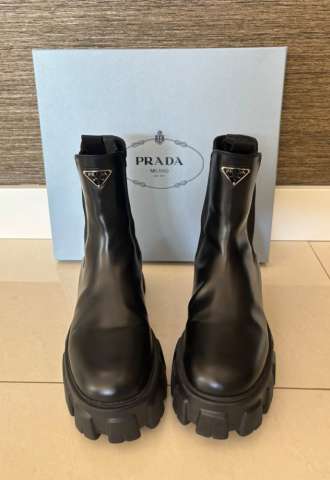 https://vipluxury.sk/Členkové monolitové čižmy Prada 40